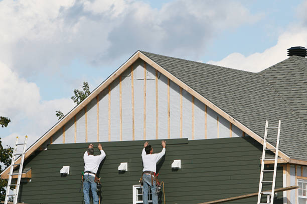 Professional Emergency Siding Repair technician working in Butler, GA